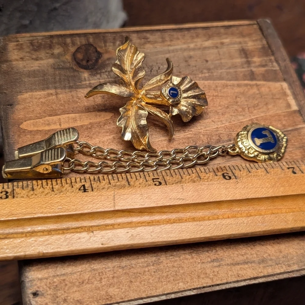 Lions Club International sweater clip and Orchid Brooch 10kt gp vintage